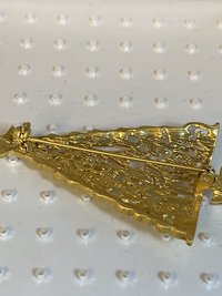Gold toned Holiday Christmas tree brooch