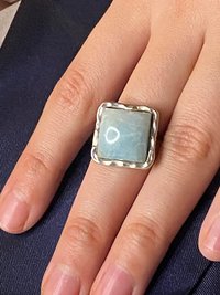 925 stamped square seal colour stone with filigree accents around the band