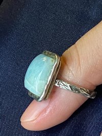 925 stamped square seal colour stone with filigree accents around the band