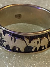 925 stamped silver elephants on parade with black accents background band