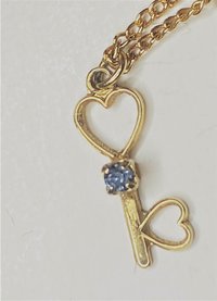 Vintage Lugano gold double plated chain with small key pendant and blue stud earrings set