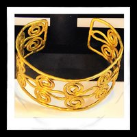 Gold toned scroll bracelet
