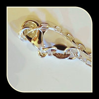 Silver necklace with Autism awareness message