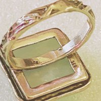 925 stamped square seal colour stone with filigree accents around the band