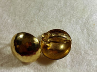 Rare Gold Tone Vintage Christian Dior Hammered Dome with Omega clips earrings.