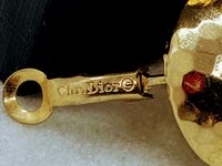 Rare Gold Tone Vintage Christian Dior Hammered Dome with Omega clips earrings.