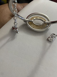 Authentic Swarovski Signed Logan Golden Shadow Bangle Bracelet and Rhodium-plated Circles Masquerade Pendant Pierced Earrings set.