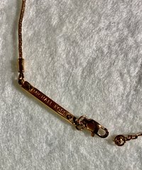 Long Curved Rose Gold Michael Kors Pendant