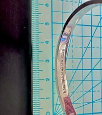 Silver tone Kate Spade “Take a Bow” bangle bracelet