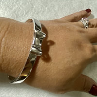 Silver tone Kate Spade “Take a Bow” bangle bracelet