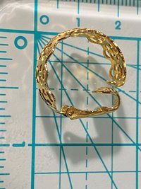 Gold tone thick Art Nouveau love scroll hoop earrings