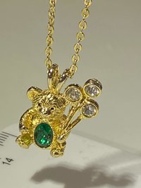 Extremely cute May green birth stone teddy bear holding crystal balloons gold tone pendant with necklace