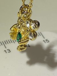 Extremely cute May green birth stone teddy bear holding crystal balloons gold tone pendant with necklace