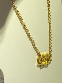 Gold tone Lotus pendant and necklace