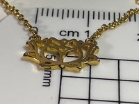 Gold tone Lotus pendant and necklace