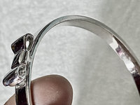 Silver tone Kate Spade “Take a Bow” bangle bracelet