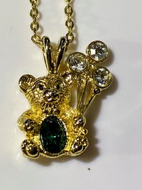 Extremely cute May green birth stone teddy bear holding crystal balloons gold tone pendant with necklace