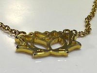 Gold tone Lotus pendant and necklace