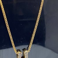 Rare authentic gold tone sparkly horseshoe  signed Juicy Couture