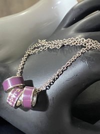 Marc By Marc Jacob - Purple metal ring as pendants on a long silver tone chain necklace