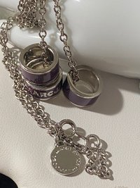 Marc By Marc Jacob - Purple metal ring as pendants on a long silver tone chain necklace