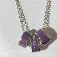 Marc By Marc Jacob - Purple metal ring as pendants on a long silver tone chain necklace