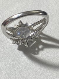 NVC snowflake rose cut encrusted in sparkly stones on silver band