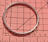 Kate Spade Silver tone studded bangle