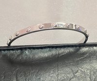 Kate Spade Silver tone studded bangle