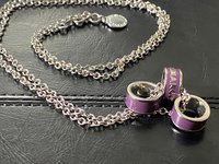 Marc By Marc Jacob - Purple metal ring as pendants on a long silver tone chain necklace