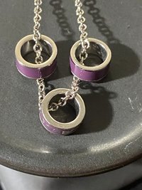 Marc By Marc Jacob - Purple metal ring as pendants on a long silver tone chain necklace
