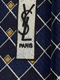 Blue  Ives St.Laurent neck tie with white and blak small geometric squares