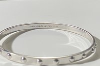 Kate Spade Silver tone studded bangle