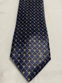 Blue  Ives St.Laurent neck tie with white and blak small geometric squares