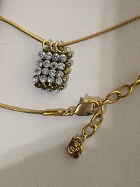 Swarovski crystals pendants signed on a gold tone Authentic