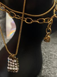 Swarovski crystals pendants signed on a gold tone Authentic