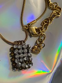 Swarovski crystals pendants signed on a gold tone Authentic