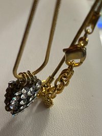 Swarovski crystals pendants signed on a gold tone Authentic