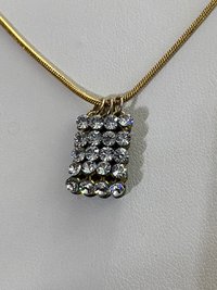 Swarovski crystals pendants signed on a gold tone Authentic