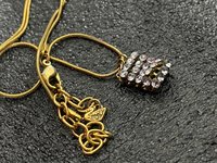 Swarovski crystals pendants signed on a gold tone Authentic