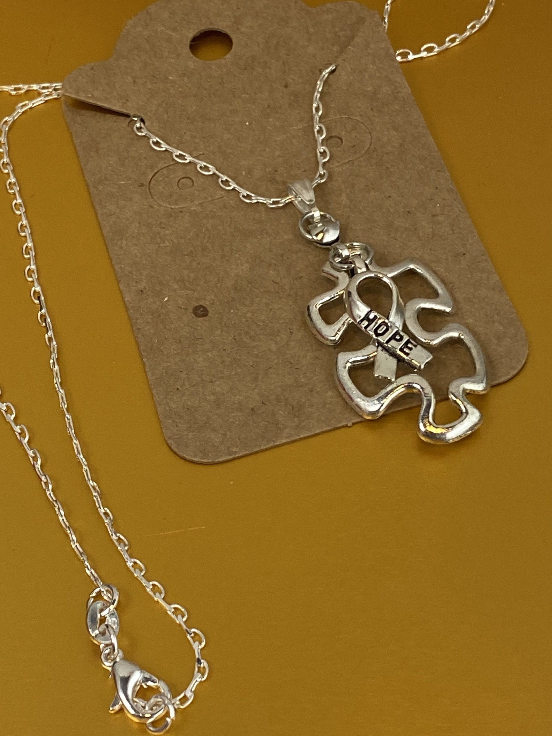 Silver Autism and hope awareness puzzle
