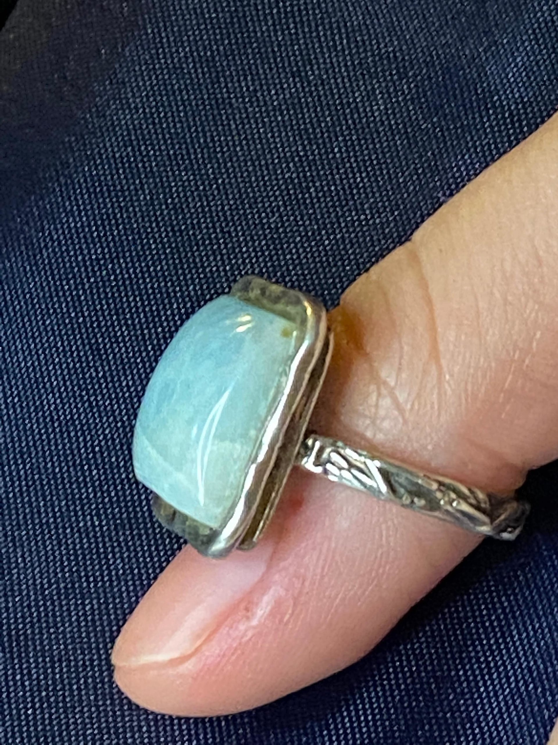 925 stamped square seal colour stone with filigree accents around the band