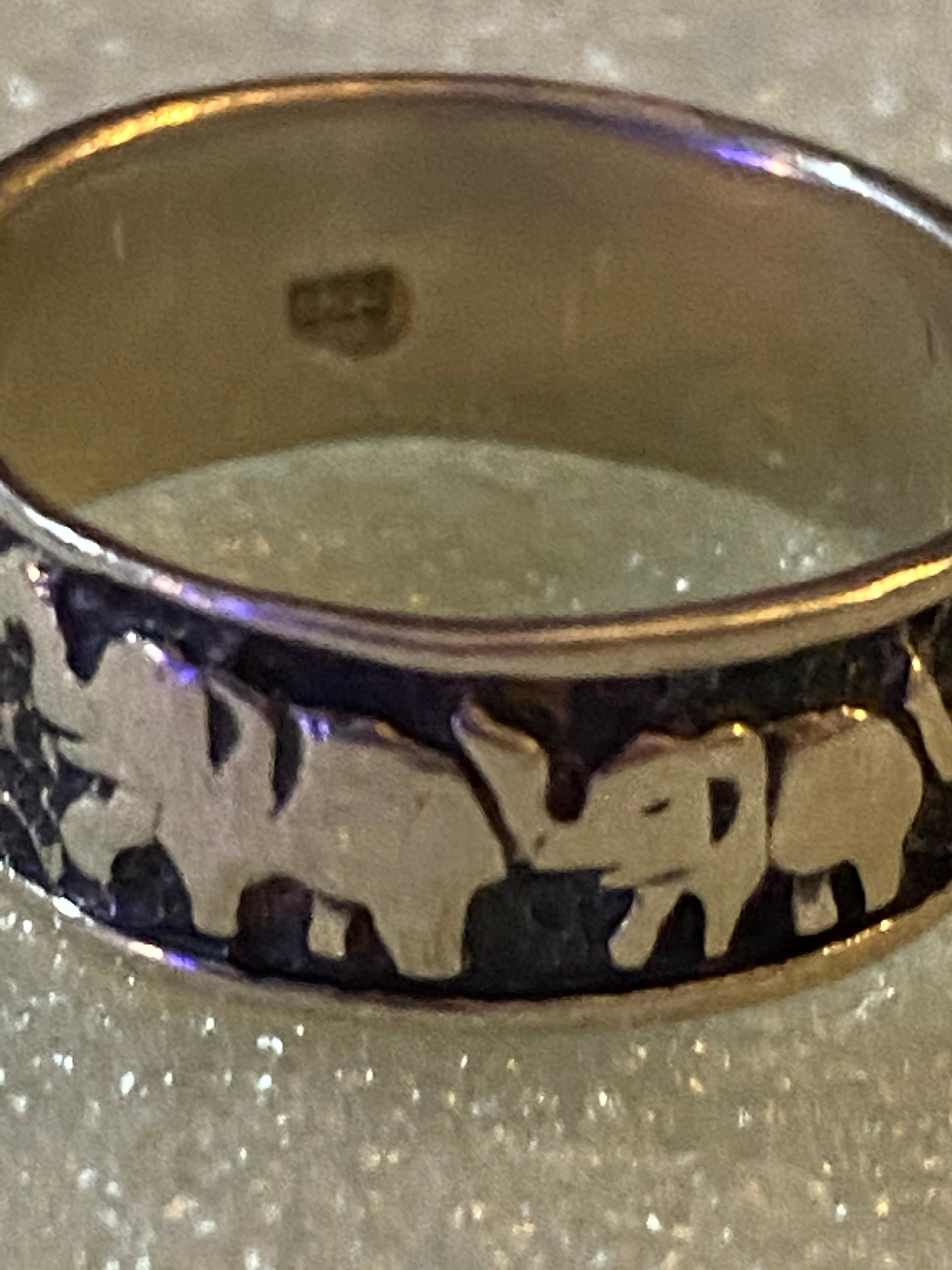 925 stamped silver elephants on parade with black accents background band