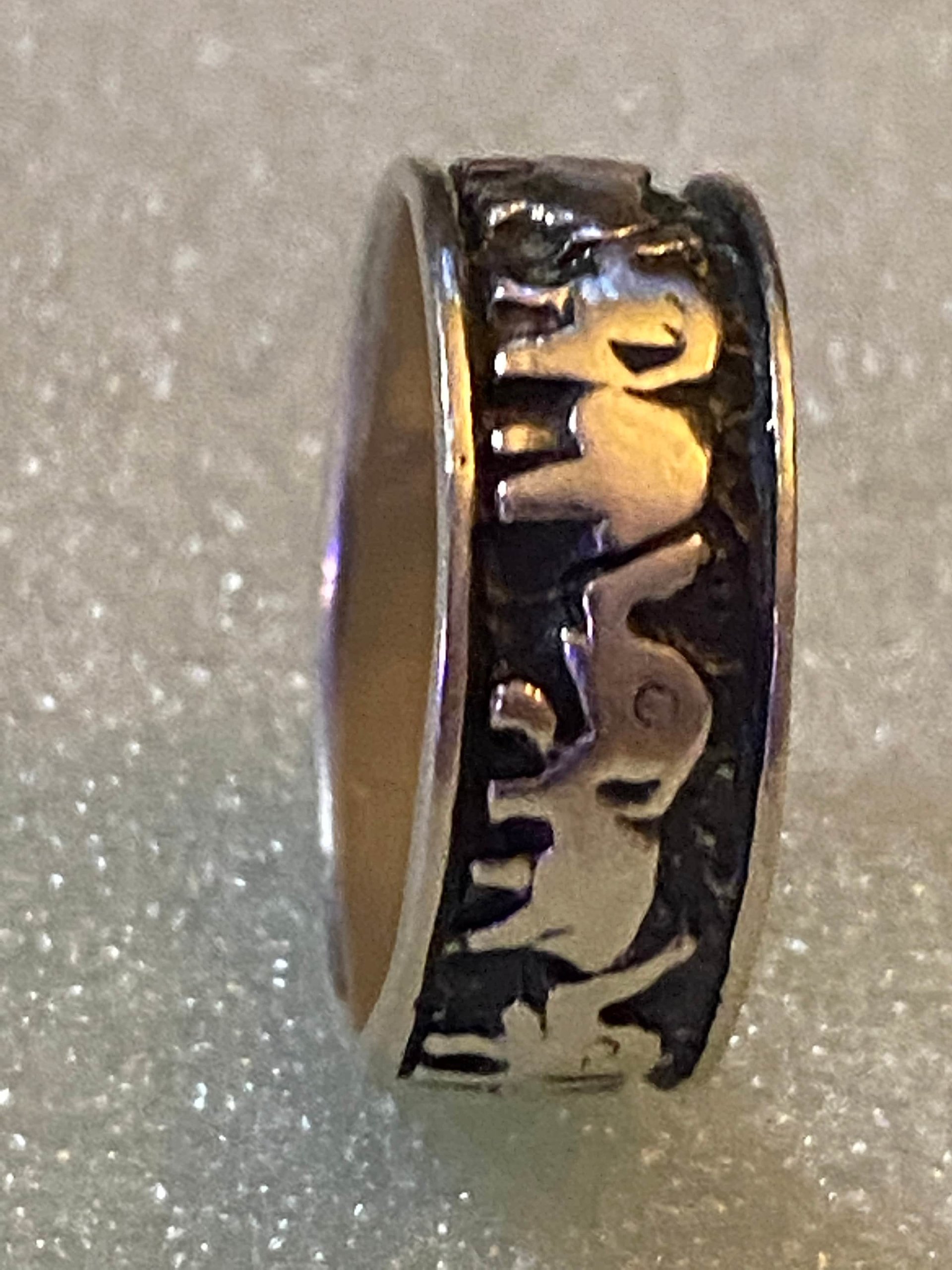925 stamped silver elephants on parade with black accents background band