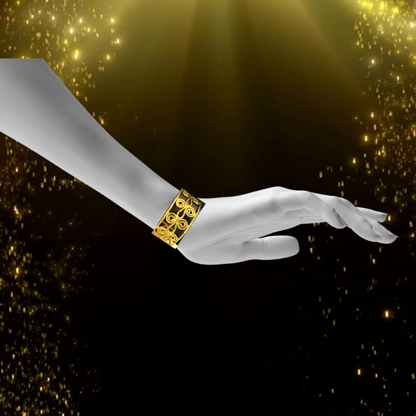Gold toned scroll bracelet