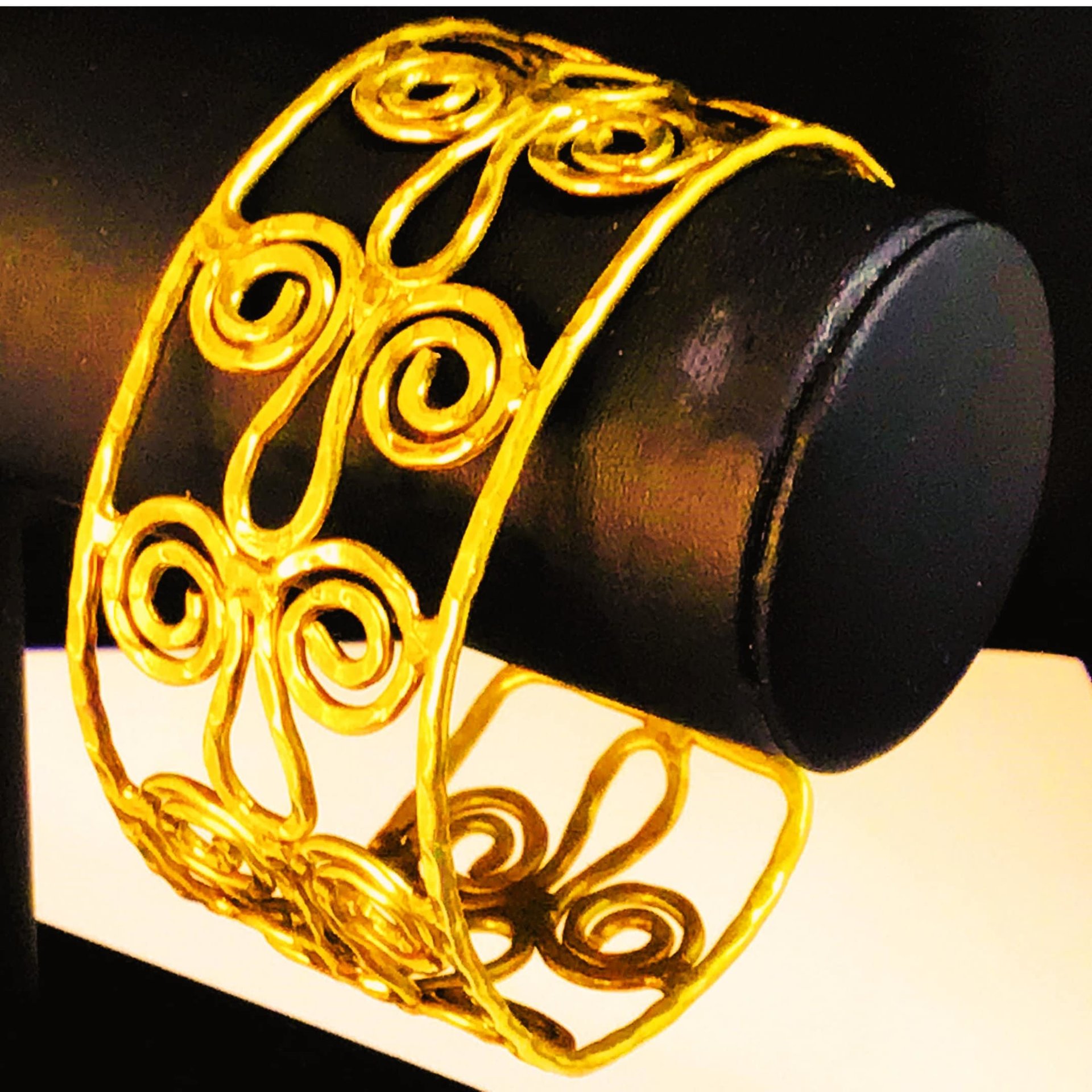 Gold toned scroll bracelet