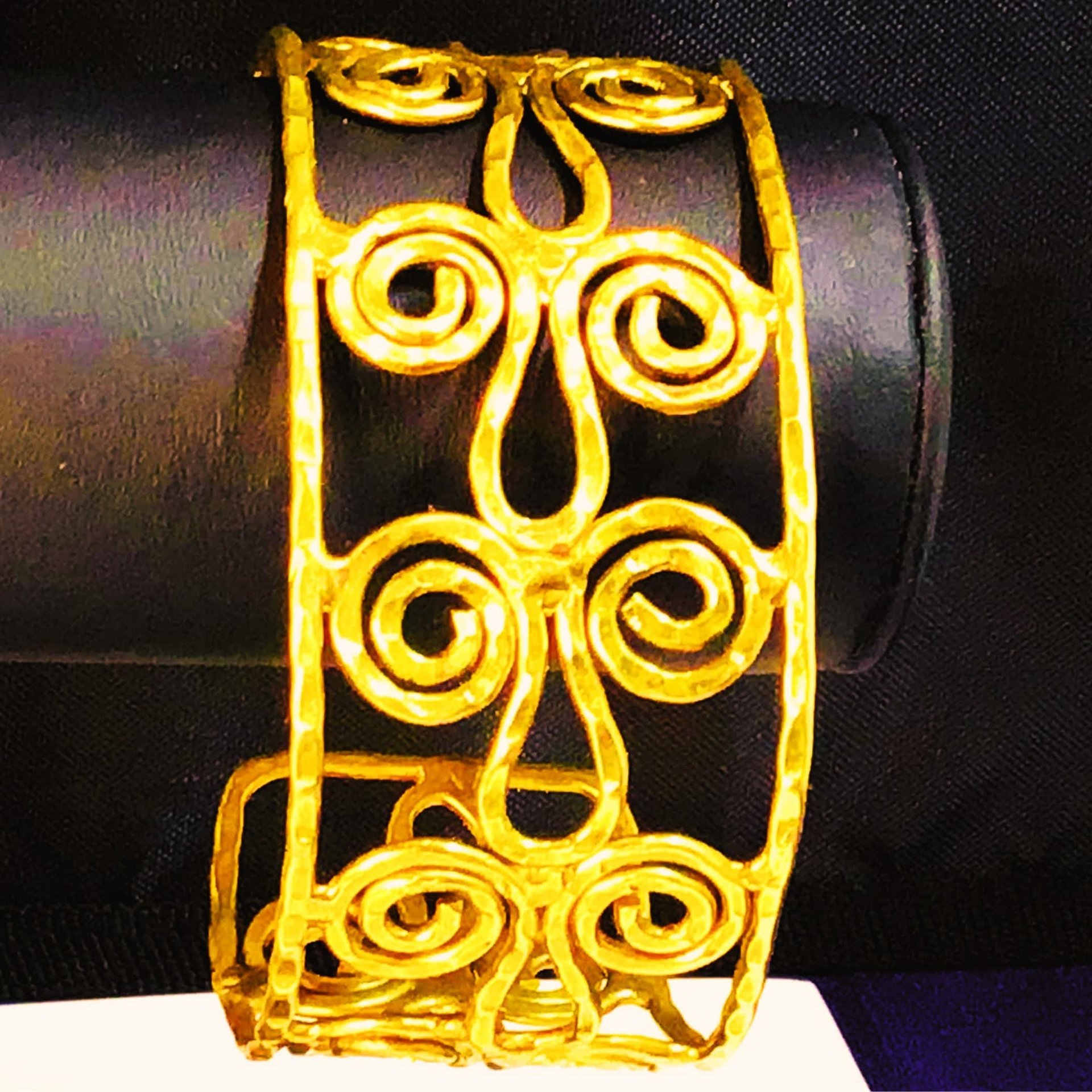 Gold toned scroll bracelet