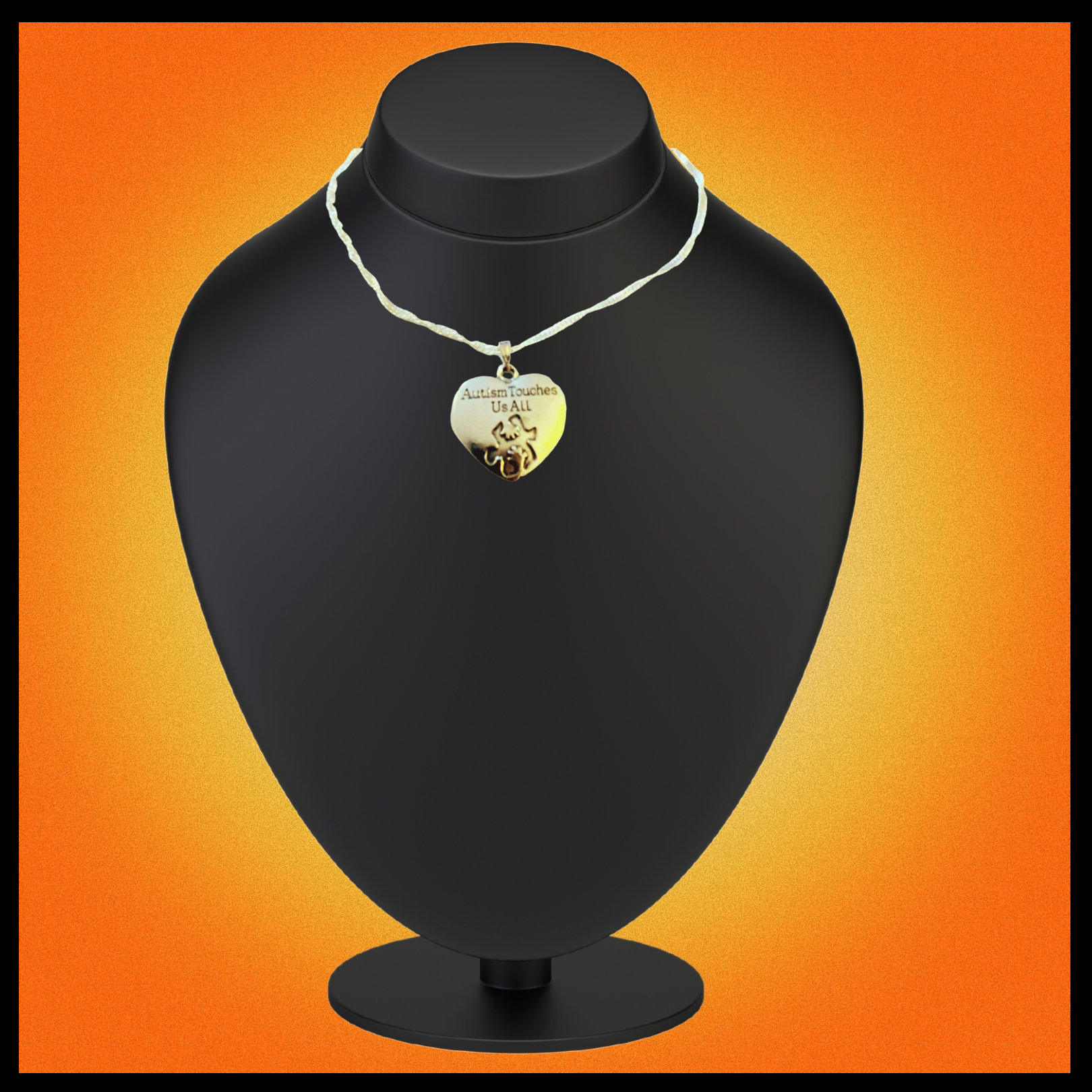 Silver necklace with Autism awareness message
