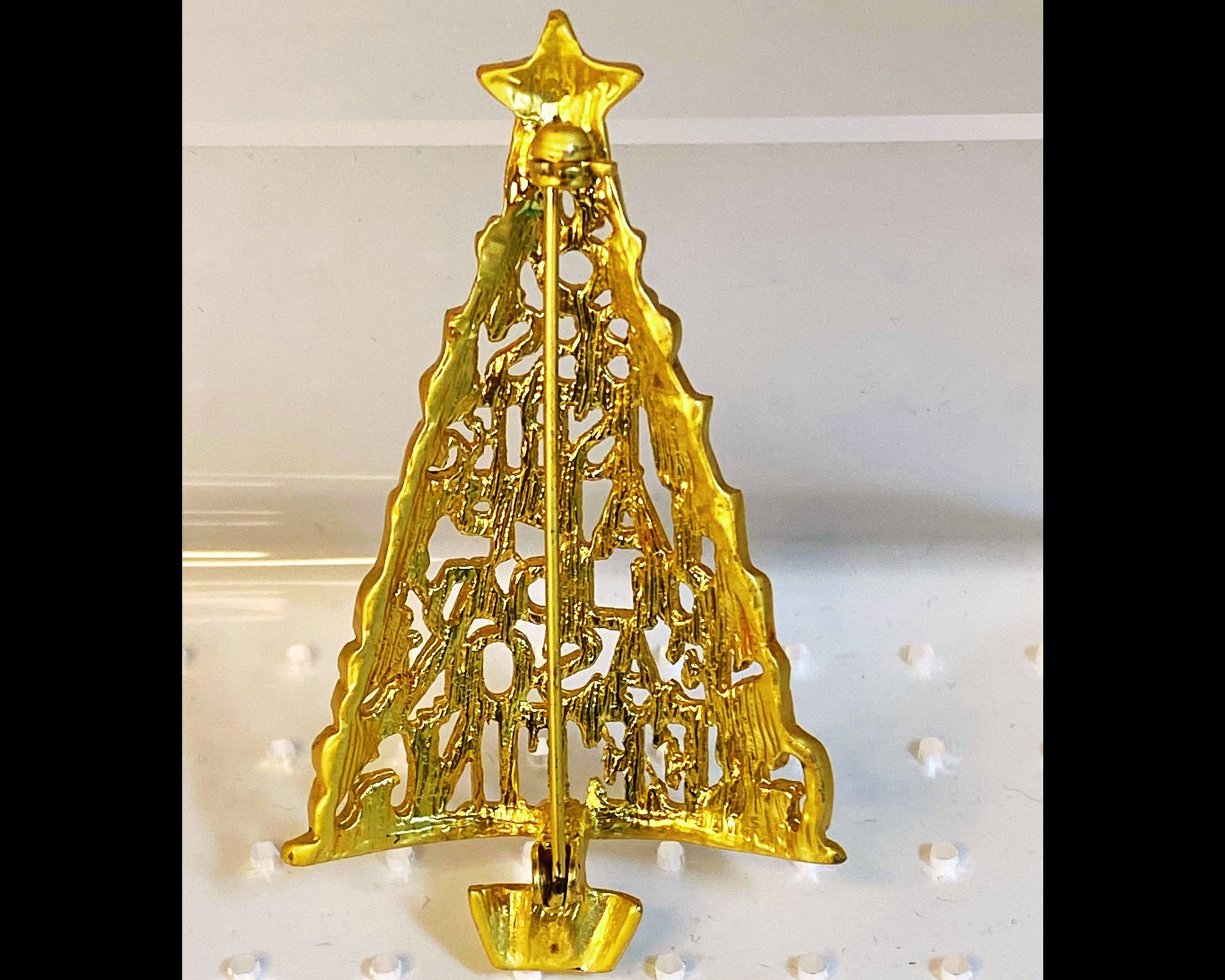 Gold toned Holiday Christmas tree brooch