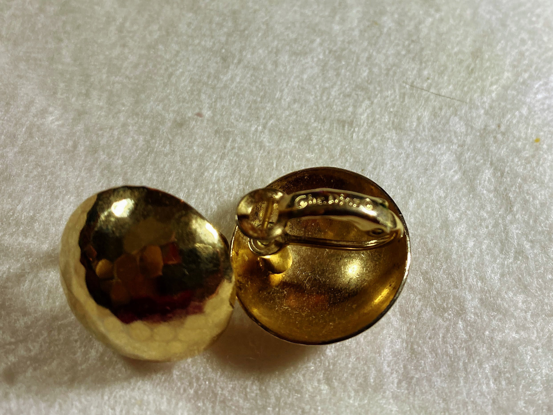 Rare Gold Tone Vintage Christian Dior Hammered Dome with Omega clips earrings.